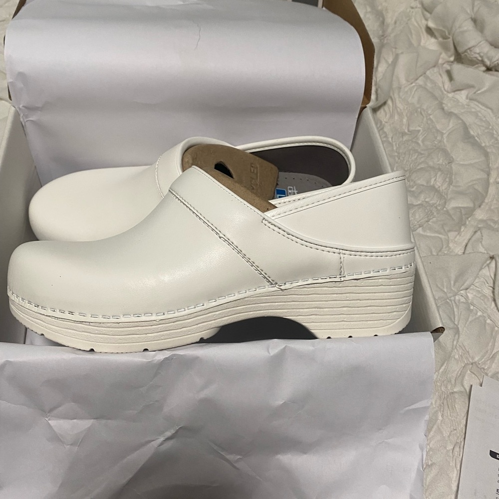 New, still in box Dansko’s nursing clogs